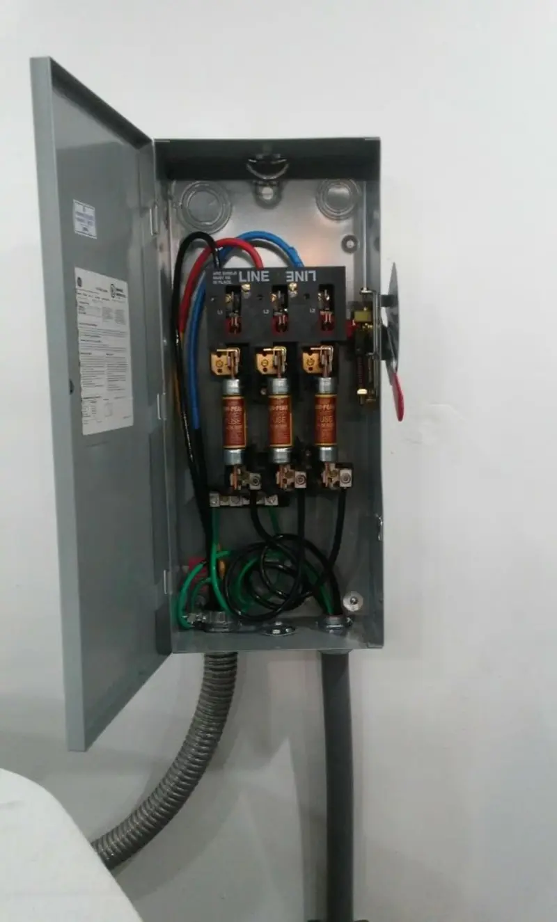Three-phase disconnect switch installed for Smoke Detector Installation in Kawkawlin